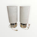 A Pair of Mid-Century Modern Chrome table Lamps with Cylindrical Beige Shades 7"D x 17"H