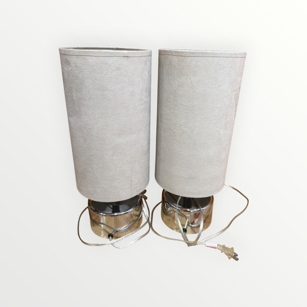 A Pair of Mid-Century Modern Chrome table Lamps with Cylindrical Beige Shades 7"D x 17"H