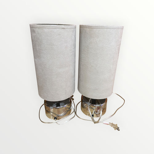 A Pair of Mid-Century Modern Chrome table Lamps with Cylindrical Beige Shades 7"D x 17"H