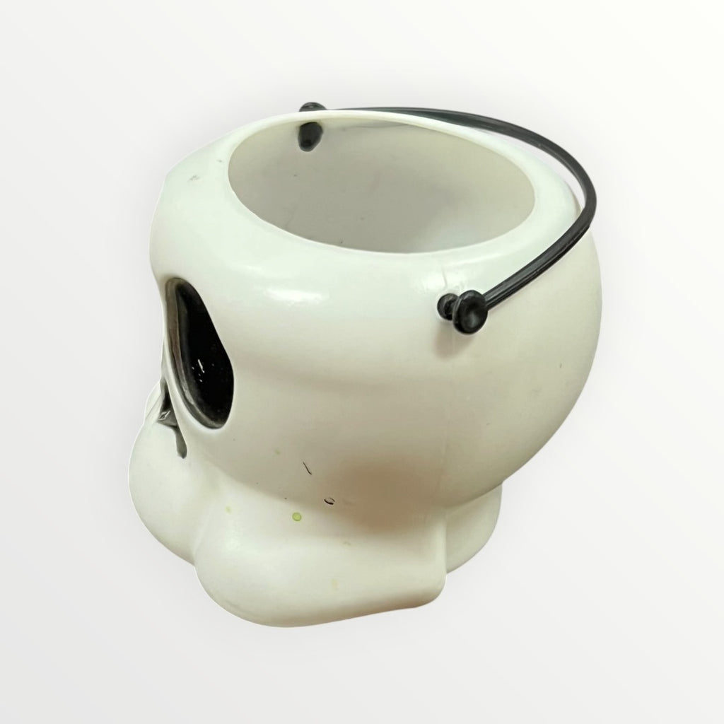 White Plastic Mini Skull-shaped Halloween Candy Bucket with a Black Handle