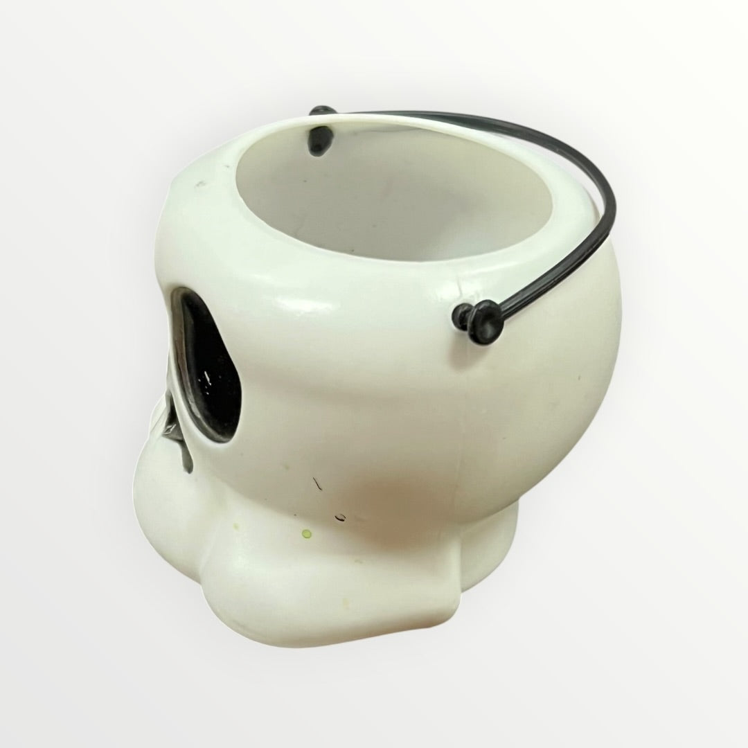 White Plastic Mini Skull-shaped Halloween Candy Bucket with a Black Handle